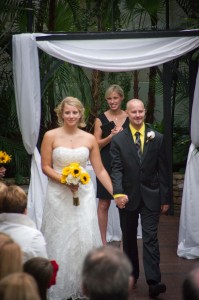 Bride,Groom,Officiant,Wedding Dress,Tuxedo,Flowers